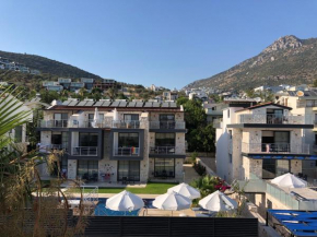 Stone House Aparts 2 plus 1 mit zwei Balkone und Poolview Kalkan No 10